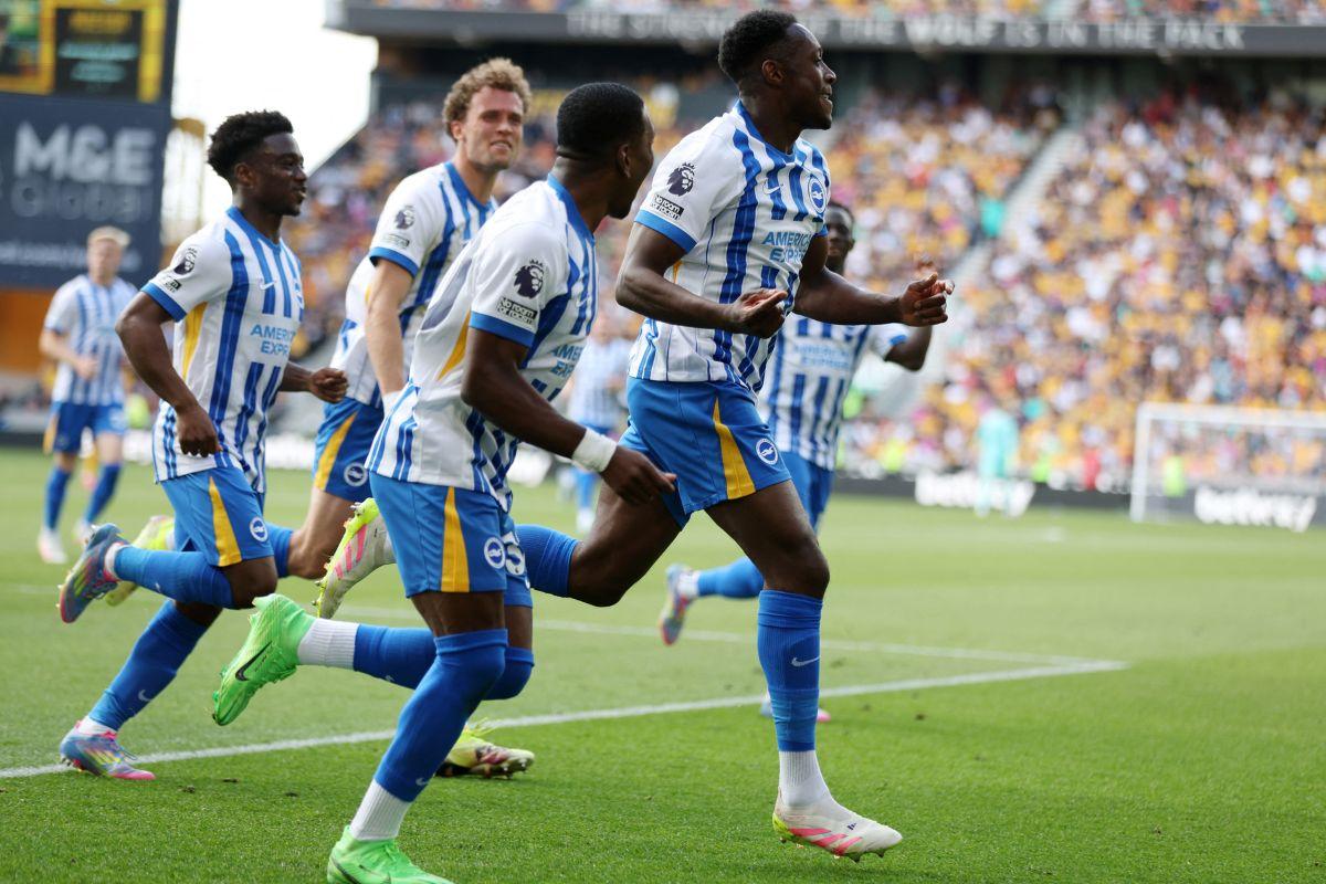 Brighton & Hove Albion's Danny Welbeck celebrates with teammates on scoring their first goal against Wolverhampton Wanderers at Molineux Stadium, Wolverhampton, Britain 