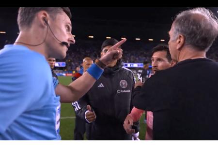 A screengrab of Messi arguing with match officials after the match as Arena tries to calm him down