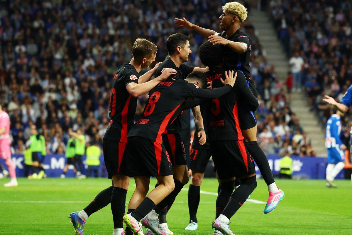 FC Barcelona's Lamine Yamal celebrates with teammates on scoring their first goal against Espanyol at RCDE Stadium, Cornella de Llobregat, Spain, on Thursday 