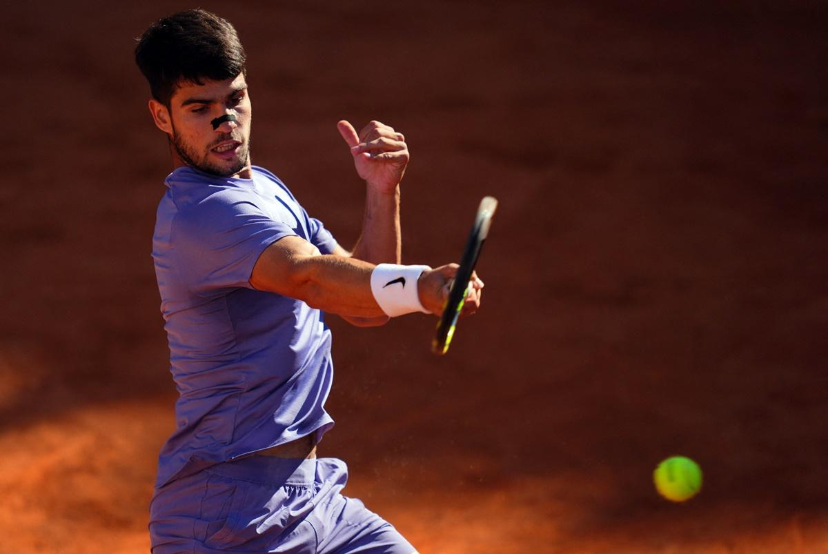 Spain's Carlos Alcaraz reached the Italian Open final for the first time after a thrilling win over local hope Lorenzo Musetti.