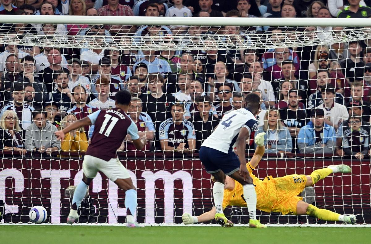 Boubacar Kamara scores Aston Villa's second goal past Tottenham Hotspur's Antonin Kinsky.