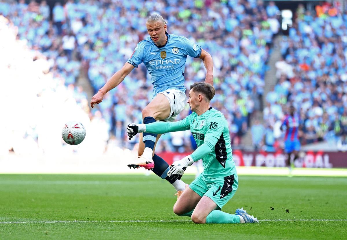 Erling Haaland is thwarted by Crystal Palace goalkeeper Dean Henderson.
