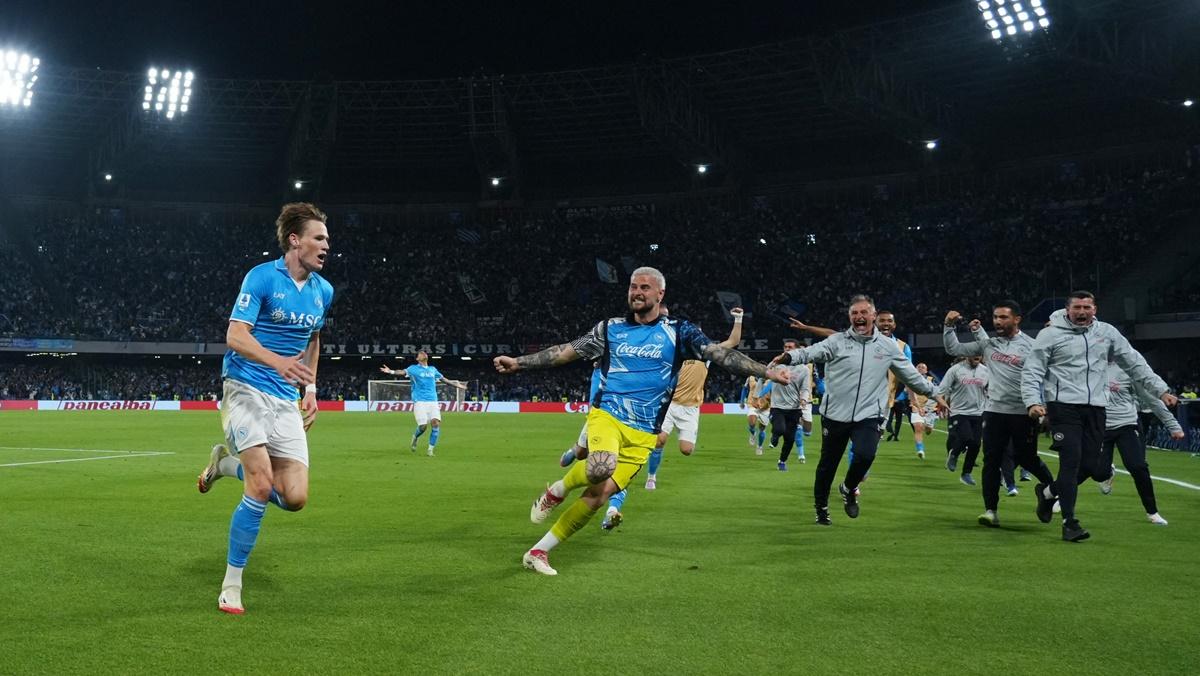 Scott McTominay celebrates scoring Napoli's first goal against Cagliari.