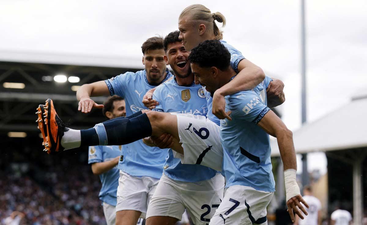 Erling Haaland celebrates with teammates