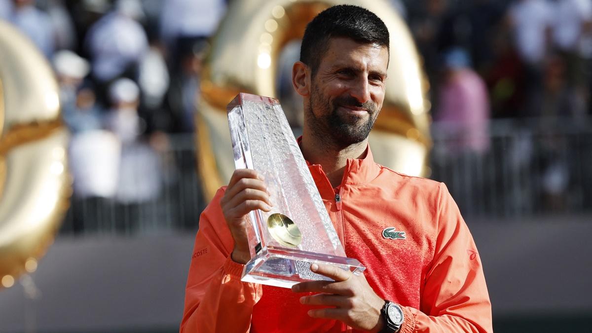 Serbia's Novak Djokovic poses with the trophy after beating Poland's Hubert Hurkacz in the final of the Geneva Open for his 100th career ATP tour title, at Tennis Club de Geneve, Geneva, Switzerland, on Saturday.