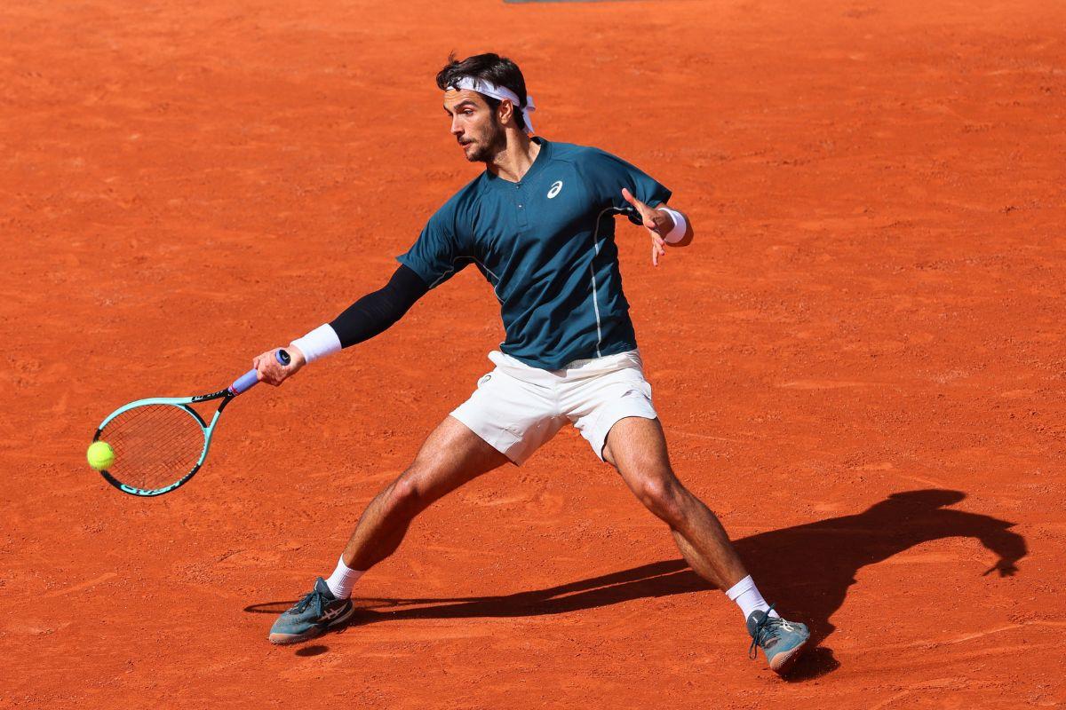 Italy's Lorenzo Musetti in action during his French Open first round match against Germany's Yannick Hanfmann at Roland Garros in Paris on Sunday