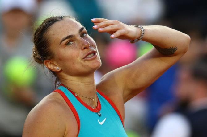 Belarus' Aryna Sabalenka celebrates winning her second round match against Switzerland's Jil Teichmann