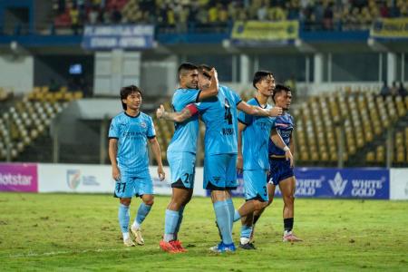 Mumbai City players celebrate their victory over Kerala Blasters in their Super Cup match in Fatorda on Thursday