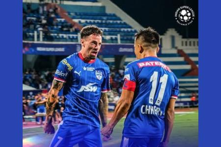 Ryan Williams and Sunil Chhetri celebrate a goal