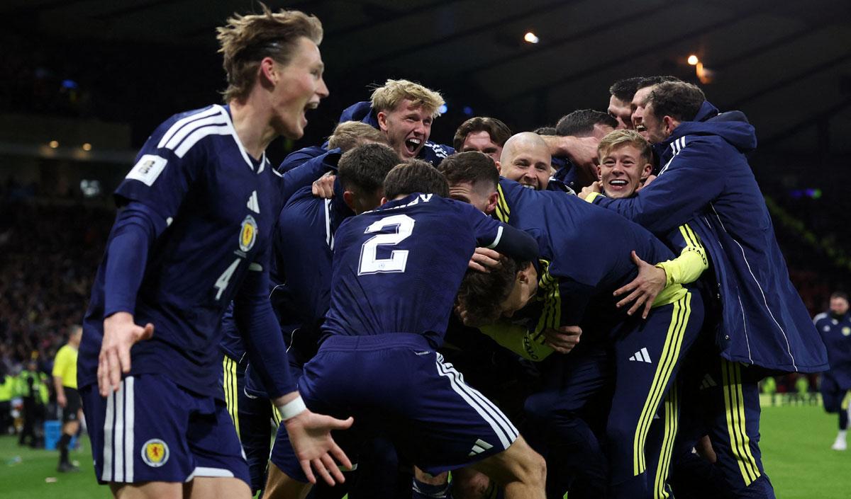 Kenny McLean celebrates scoring Scotland's fourth goal Kenny McLean celebrates scoring Scotland's fourth goal