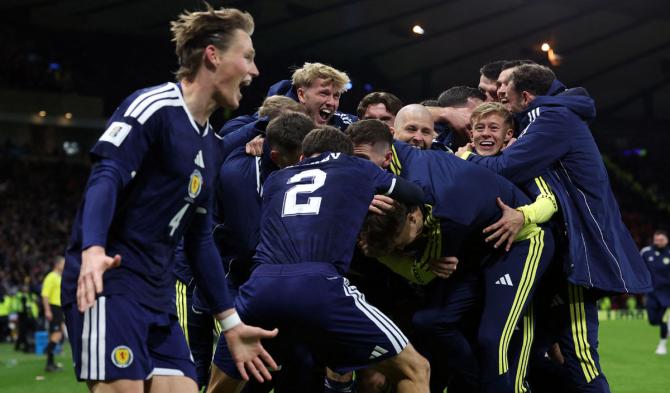 Kenny McLean celebrates scoring Scotland's fourth goal Kenny McLean celebrates scoring Scotland's fourth goal
