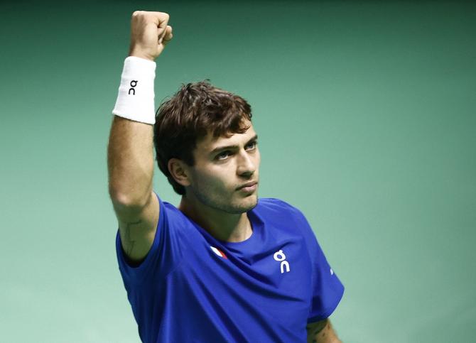 Italy's Flavio Cobolli reacts during his Davis Cup semi-final singles match against Belgium's Zizou Bergs, at SuperTennis Arena, Bologna, Italy, on Friday.