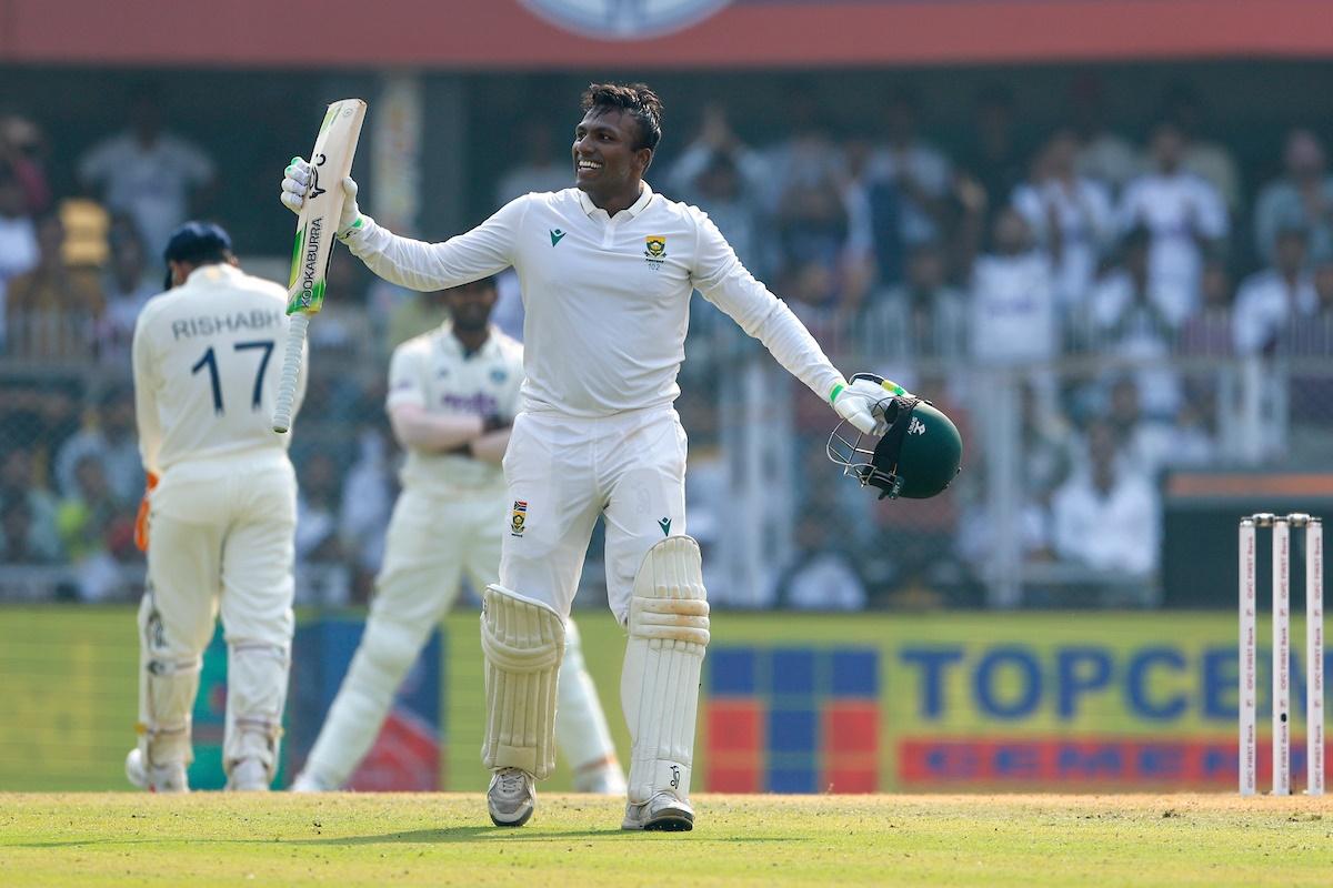 Senuran Muthusamy exults after scoring a hundred on Day 2 of the second Test against India at ACA Stadium, Guwahati, on Sunday.