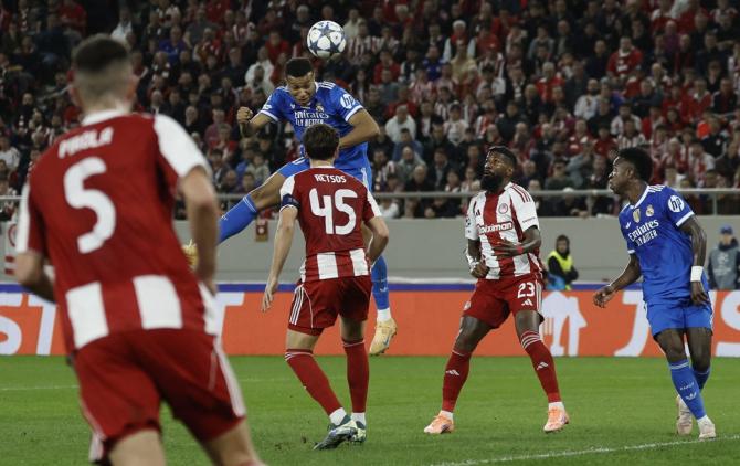Kylian Mbappe scores Real Madrid's second goal against Olympiacos, at Georgios Karaiskakis Stadium, Piraeus, Greece.