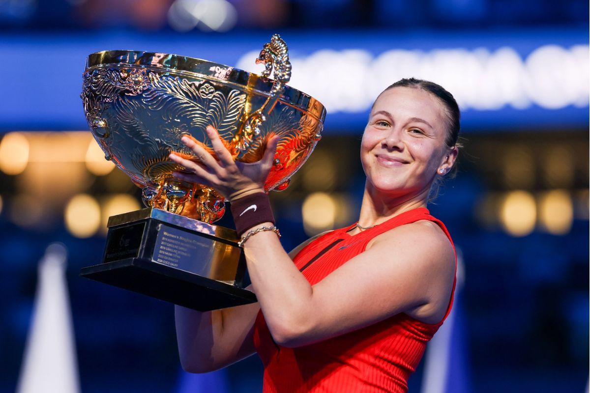 Amanda Anisimova celebrates on winning the China Open in Beijing on Sunday