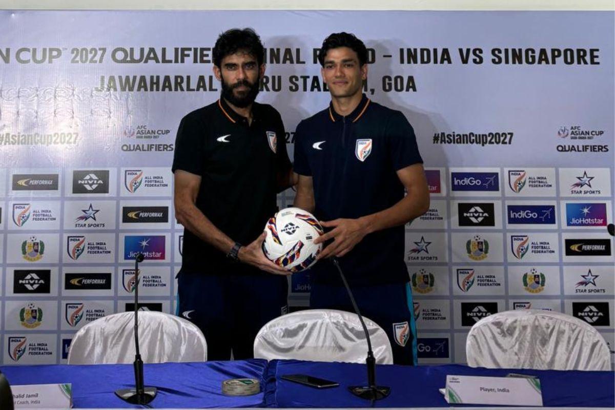 India coach Khalid Jamil with defender Pramveer Singh at the pre-match press conference