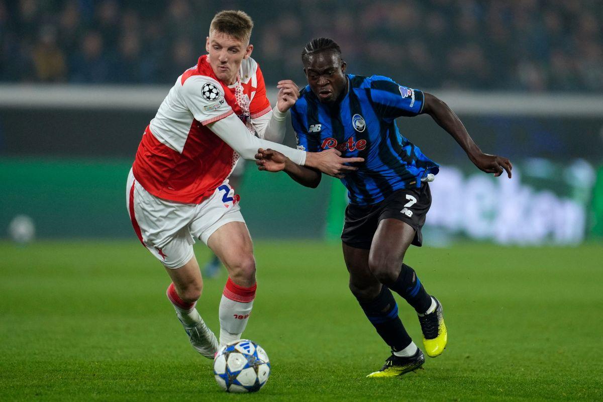 Slavia Prague's Stepan Chaloupek in action with Atalanta's Kamaldeen Sulemana