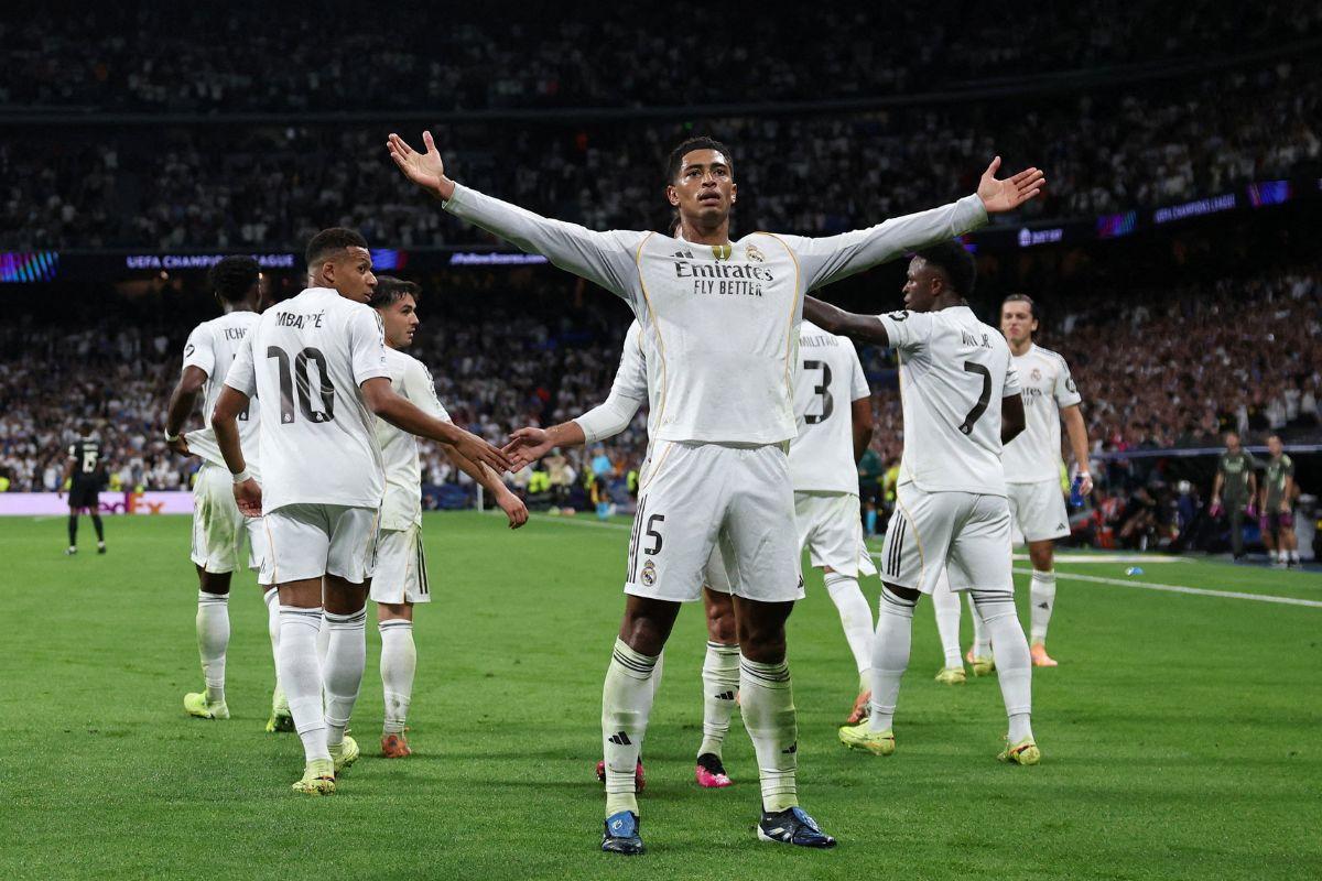 Real Madrid's Jude Bellingham celebrates scoring their first goal against Juventus in their UEFA Champions League match at Santiago Bernabeu, Madrid, Spain, on Wednesday
