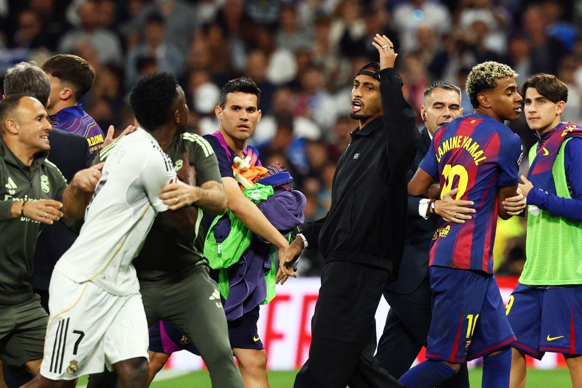 FC Barcelona's Lamine Yamal and Real Madrid's Vinicius Junior clash after the EL Clasico match at Santiago Bernabeu, Madrid, Spain, on Sunday