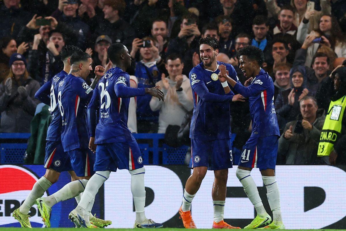 Chelsea's Estevao celebrates with teammates after scoring their fourth goal against Ajax Amsterdam at Stamford Bridge, London