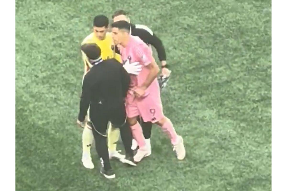 A screengrab of Luis Suarez spitting goes viral