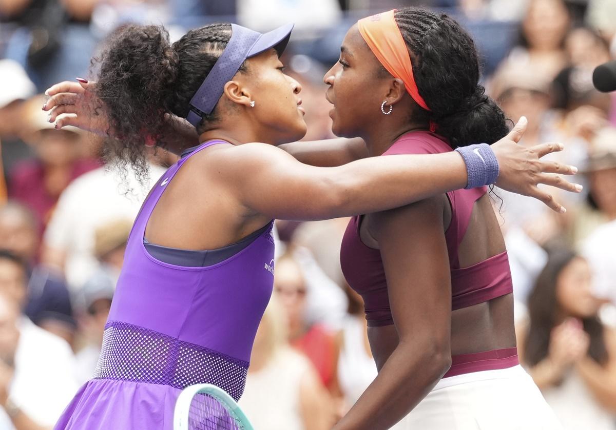 Naomi Osaka and Coco Gauff embrace after their Roound of 16 match.