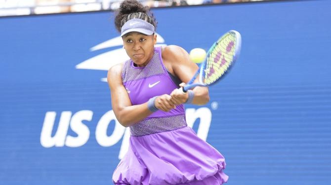 Japan's Naomi Osaka makes a backhand return to Coco Gauff of the United States during the last 16 match of the US Open, at the USTA Billie Jean King National Tennis Center, on Monday.