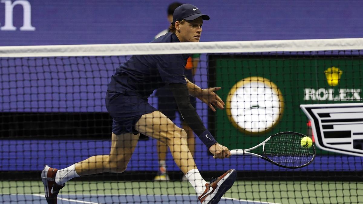Italy's Jannik Sinner rushes to the net to make a backhand drop against Kazakh 23rd seed Alexander Bublik during the US Open Round of 16 match at Billie Jean King National Tennis Center on Monday.
