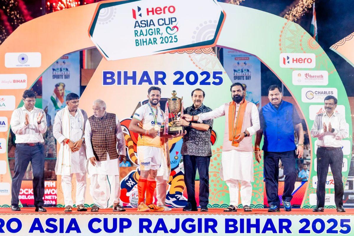 Indian Hockey Captain Harmanpreet Singh is handed the Asia Cup trophy after their win over South Korea in Rajgir, Bihar, on Sunday