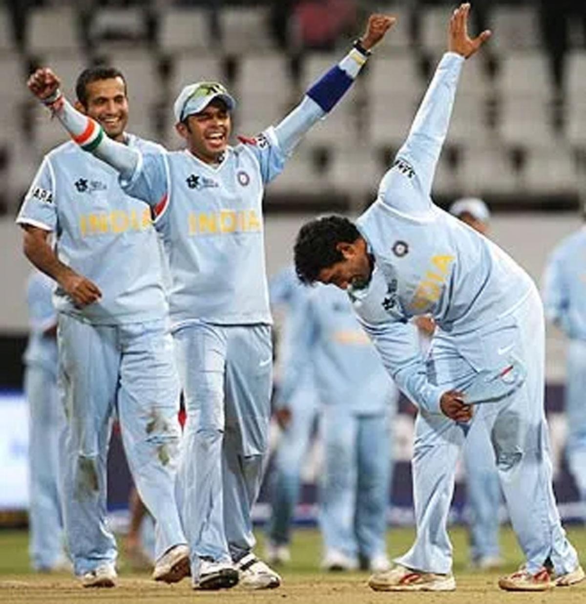 India's players celebrate winning the bowl-out