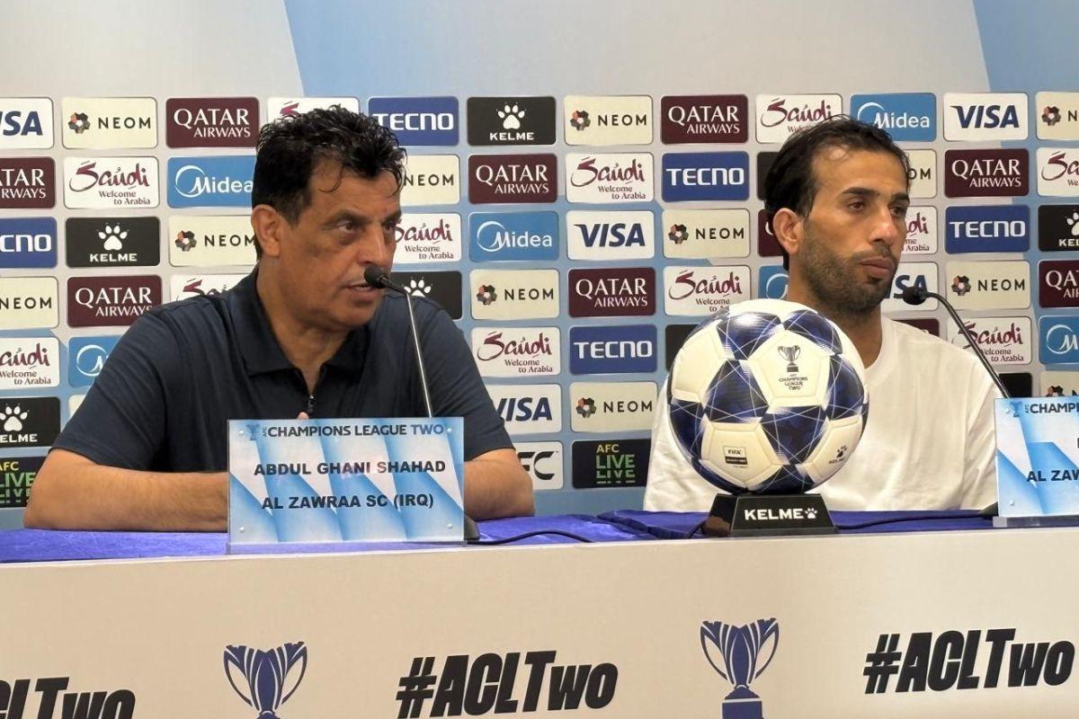 Al Zawraa coach Abdul Ghani Shahad with captain and Player of the Match Jalal Hassan at the post-match press conference