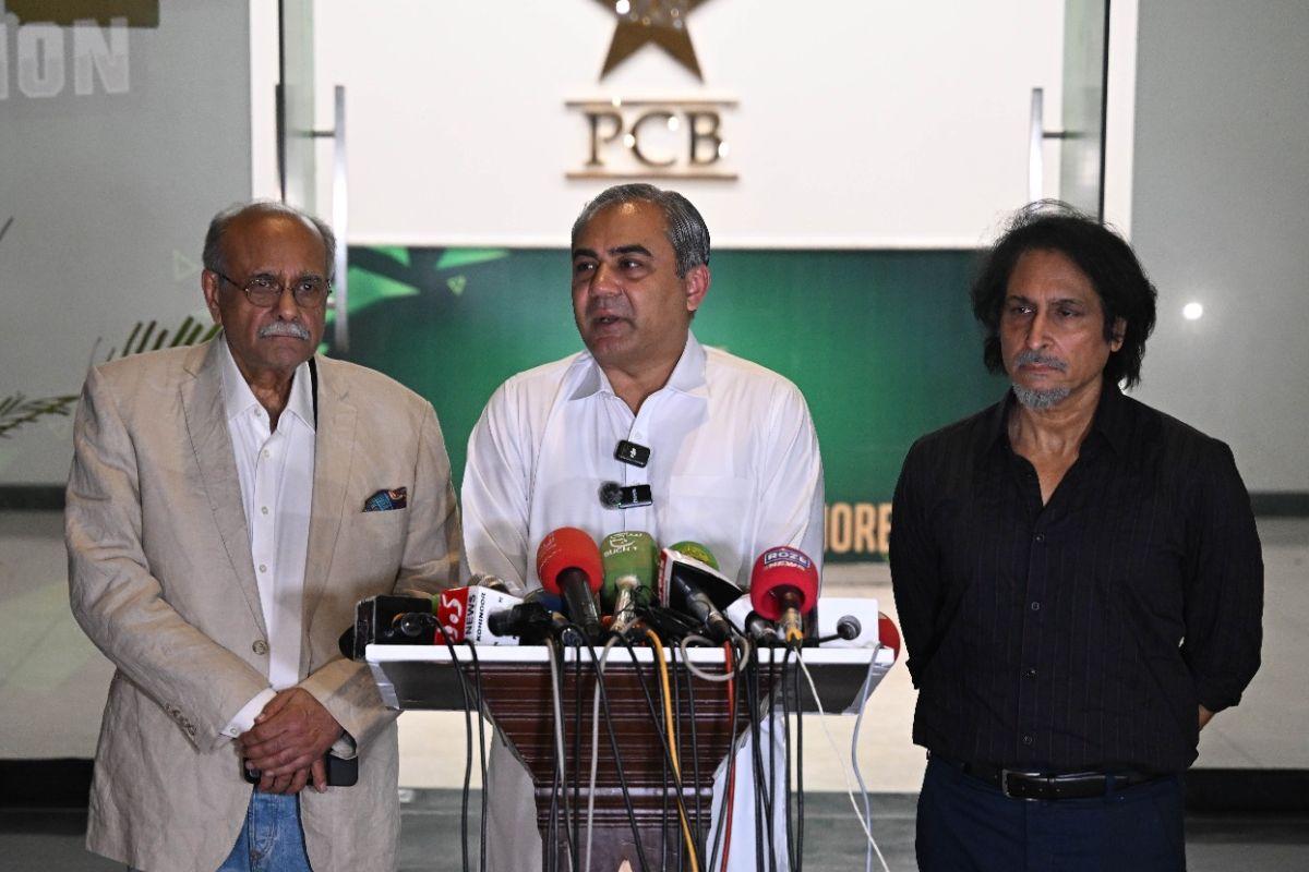 Pakistan Cricket Board Chairman Mohsin Naqvi is flanked by former chairmen Ramiz Raja and Najam Sethi as they address the media in Lahore on Wednesday