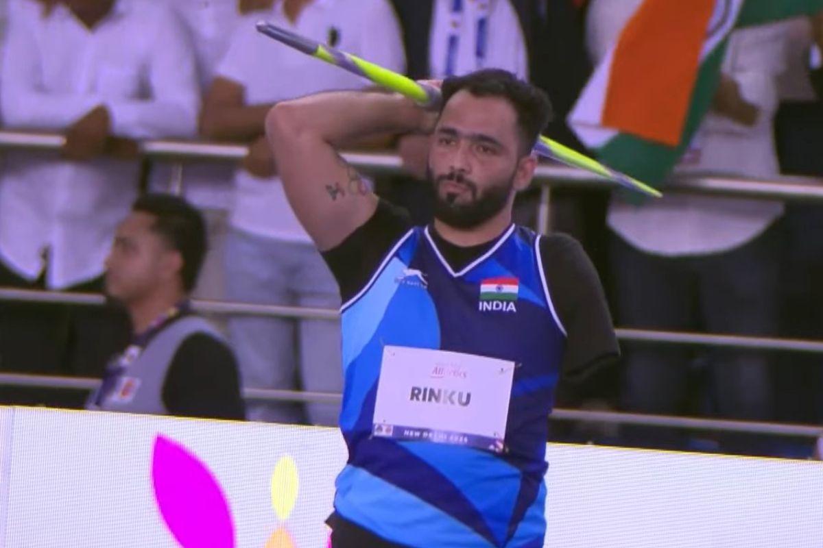 Rinku Hooda set a new record throwing his javelin at a distance of 66.37m to win the gold World Para Athletics Championships in the men's javelin throw F46 event, in New Delhi on Monday