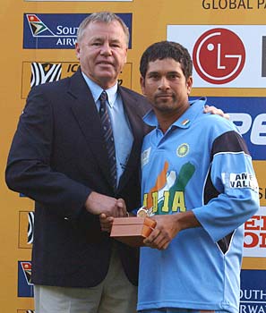 South African cricket legend Mike Proctor hands Sachin his Man of the Match trophy after the Pakistan game